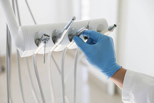 Professional Tooth Extraction technician working in La Grange, TX